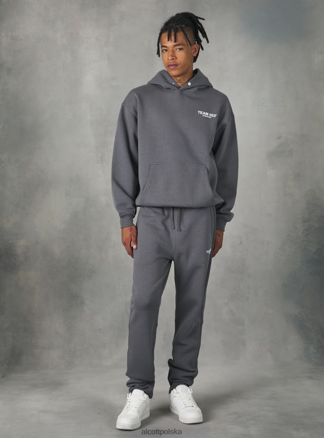 odziez_alcott_spodnie_jogger_z_nadrukiem_druzyny_053_bg1_bezowy_ciemny_mezczyzni_2txff6711.jpg odzież Alcott Spodnie jogger z nadrukiem drużyny 053 bg1 beżowy ciemny mężczyźni 2TXFF6711 - Image 1